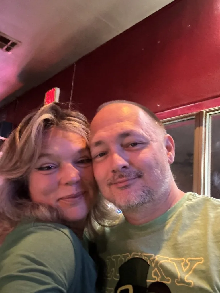 Darrell with a friend at a bar