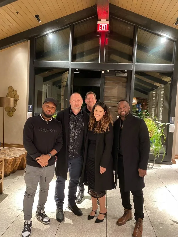 Group photo with colleagues at a restaurant