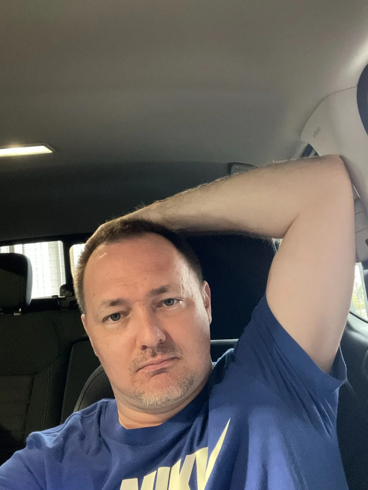 Darrell in his car